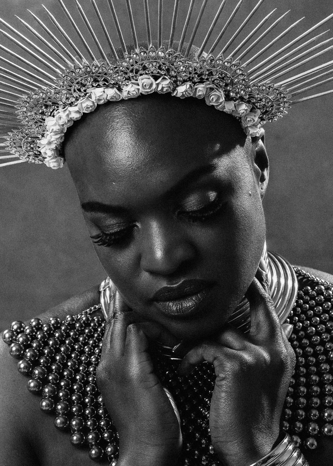 vancouver boudoir photographer image of plus size black woman with alopecia wearing neck piece and sun crown