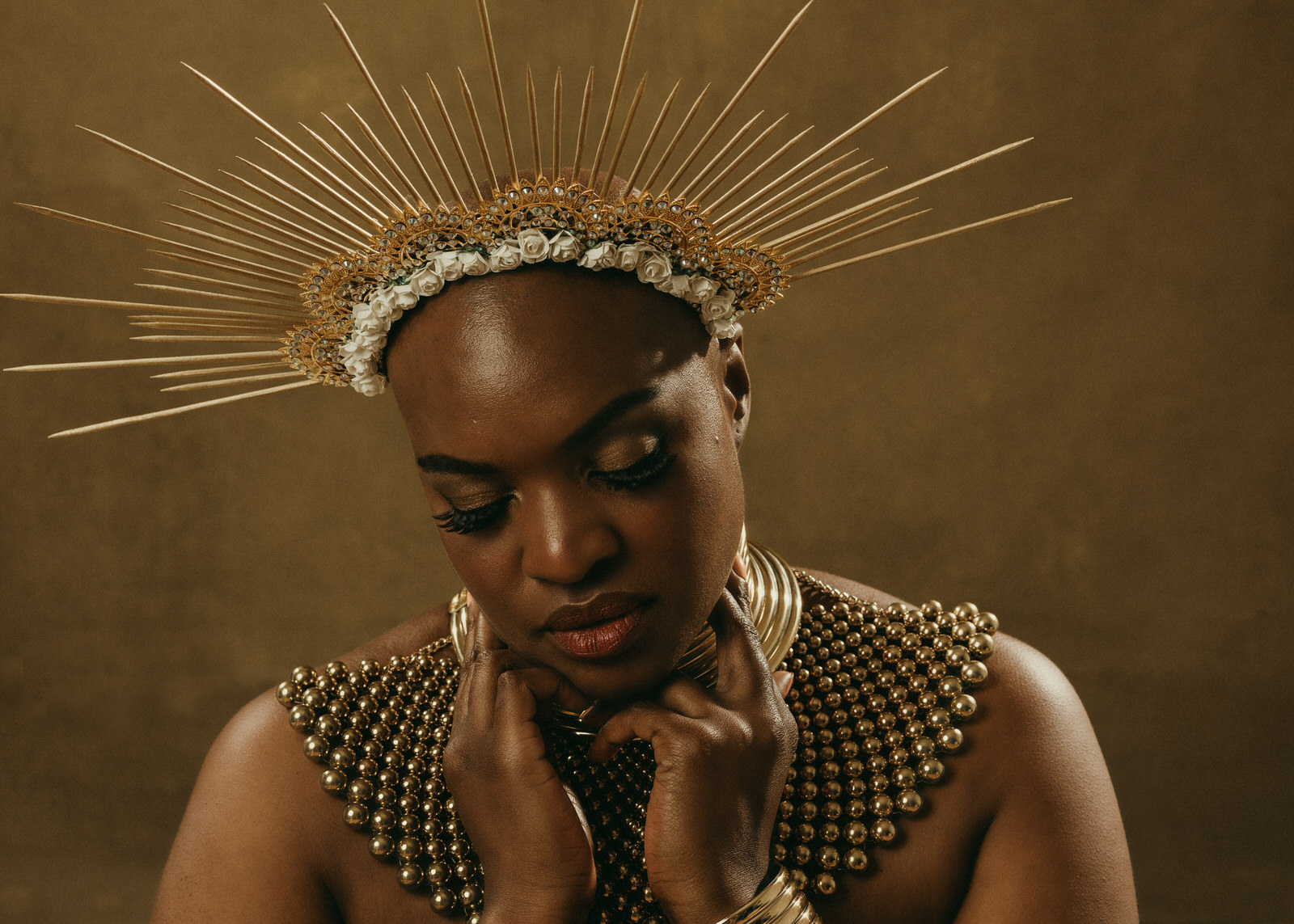 vancouver boudoir photographer image of plus size black woman with alopecia wearing sun crown