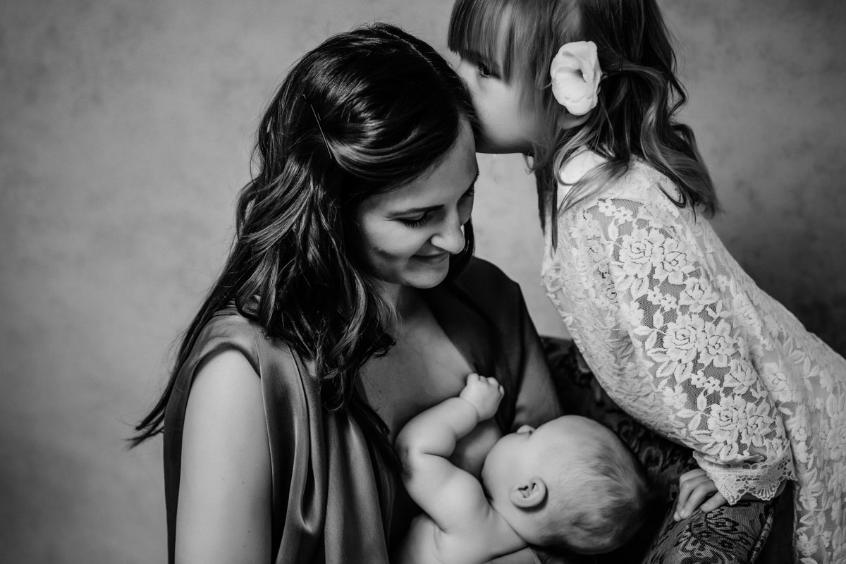 connection portraits of mother, daughter and newborn baby